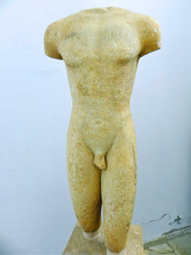 Photo of Torso of a Kouros in Museum of Delos, Mykonos, Greece.