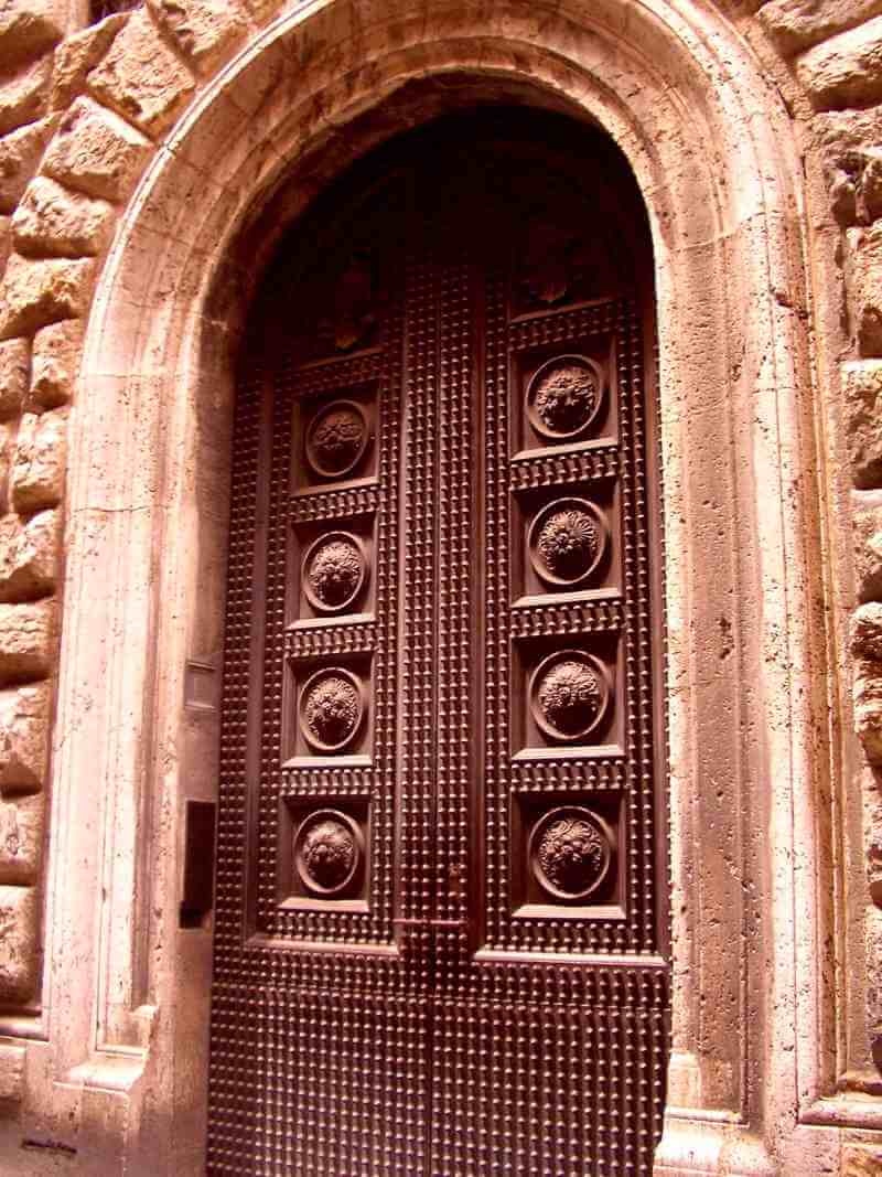 Photo of wooden door in Siena
