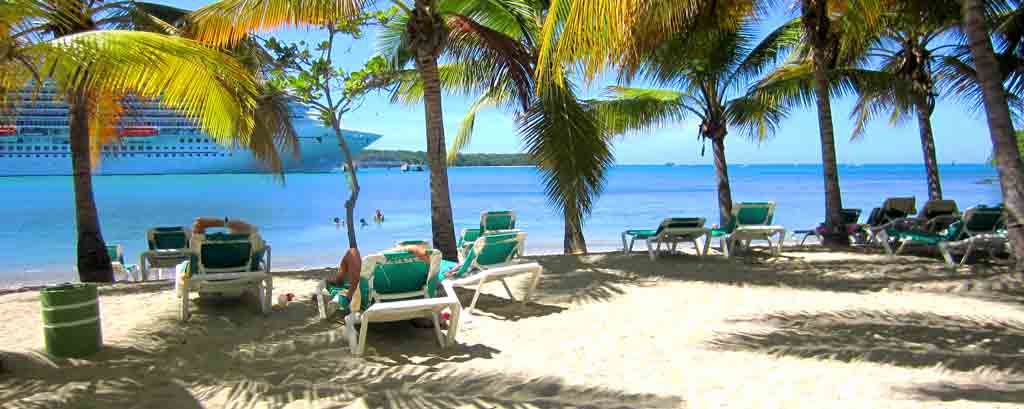 Photo of Maimon beach and cruise ship docked at Amber Cove cruise port