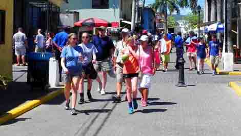 Photo of cruise passengers walking in Falmouth historical town