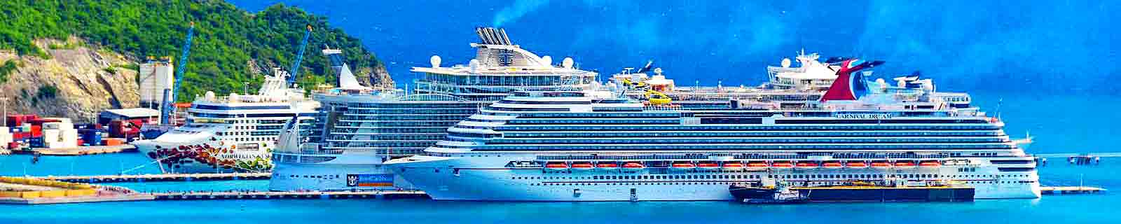 Panoramic photo of Sint Maarten cruise port with three ships docked