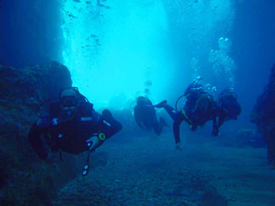 Photo of Tragkonisi Caverns in Mykonos, Greece.